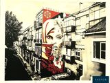 peinture représentant le visage d'une femme sur la façade d'un immeuble