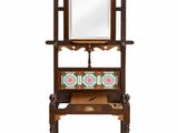 a wooden shelf with a mirror on top of it next to a shelf