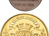 deux pièces d'or et d'argent sur lesquelles figure un blason