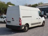 a white van that is parked in a parking lot