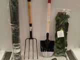a lot of gardening tools that are sitting on a table