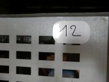 a sign that says 12 12 on the side of a machine