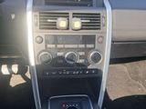 a picture of a car dashboard with a car radio in it