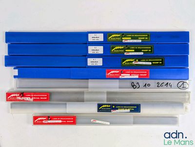 a lot of pens that are sitting on a table
