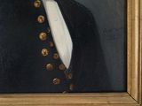 portrait of a man in a black coat and white shirt