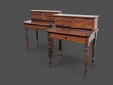 deux tables en bois surmontées de tiroirs, sur fond gris