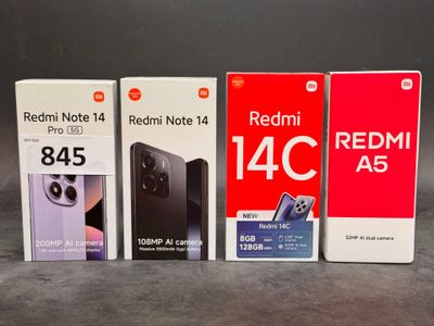 three redmi note 14 pro and redmi note 14 are on display