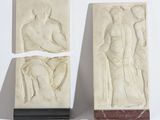 une paire de reliefs en plâtre représentant une femme et un homme