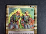 a picture of a card with a picture of two men in armor