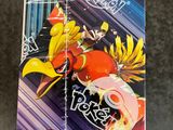 a close up of a box of pokemon cards on a table