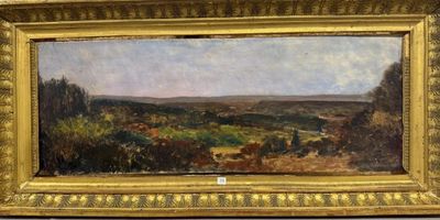 une image d'un tableau représentant un paysage dans un cadre doré