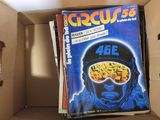 a book in a cardboard box with a picture of a man in a helmet