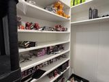 a large pantry with a lot of items on the shelves