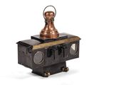 a small metal object that is on top of a table