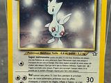 a close up of a pokemon card on a table