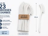 deux brosses à dents et un tube de dentifrice posés l'un à côté de l'autre