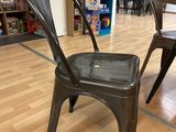 two chairs that are sitting in the middle of a room
