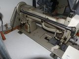 a sewing machine that is sitting on a table