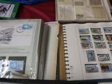 many different types of stamps in a binder on a table