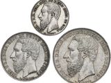 trois pièces d'argent sur lesquelles figurent un homme et une femme