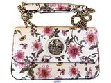 un sac à main blanc orné de fleurs roses et muni d'une chaîne dorée