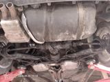 a close up of a car ' s exhaust pipe and exhaust pipe