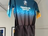 a shirt hanging on a hanger in a room
