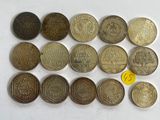 a lot of coins that are on the table