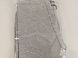 a close up of a pair of gray pants on a white surface