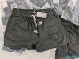 a pair of shorts that are sitting on a table