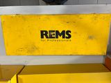 a yellow bench with a sign on it that says rems for professionals