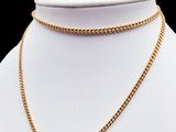 a gold chain necklace on a mannequin mannequin mannequin mannequin mannequin mannequin mannequin mannequin manne