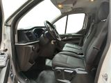 the interior of a car with the door open and the driver ' s seat down