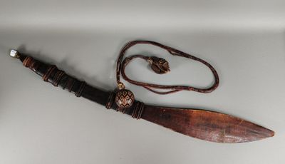 a knife that is laying on a table