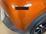 a close up of a car with a sticker on it