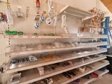 many shelves with various items on them in a store