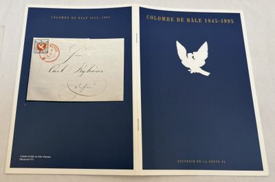 un livre ouvert sur lequel figure l'image d'une colombe