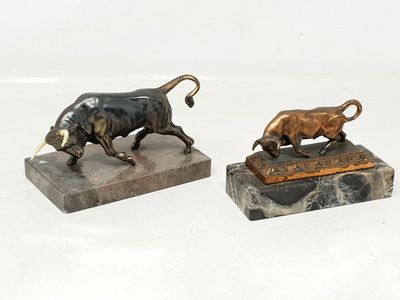 pair of bronze bull and bull figurines on marble bases