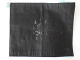 a close up of a piece of cloth with a drawing on it