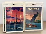 two bags of luggage sitting on a table