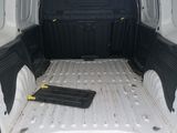 the back end of a van with the cargo door open