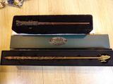 three different types of wands in a box on a table
