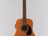 a close up of a guitar hanging from the ceiling