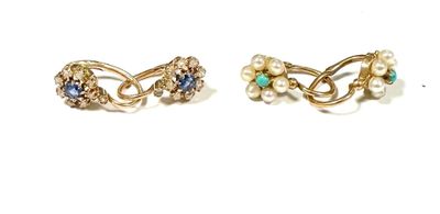 two pairs of earrings with pearls and stones on a white surface