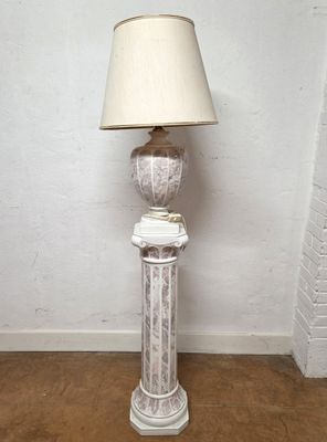 a lamp that is sitting on top of a wooden table