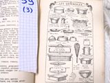 un livre ouvert sur lequel figure un dessin représentant des ustensiles de cuisine