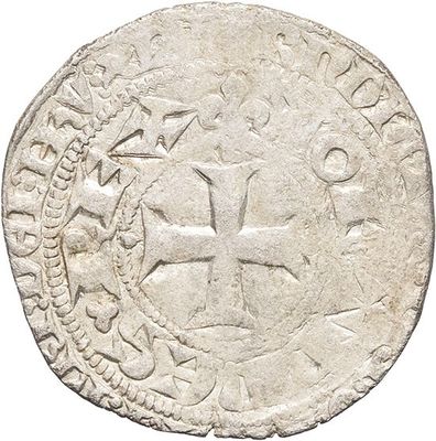 an old silver coin with a cross on it