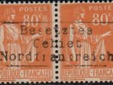 two orange postage stamps with a picture of a woman and a man