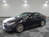 a picture of a black car parked on a checkered floor