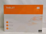 the box of the tablet is sitting on a white surface